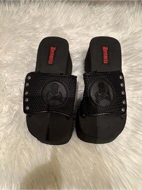 Demonia Black Platform Slide Sandals with Red Logo